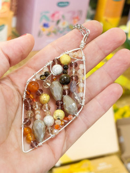 Collana con ciondolo rombo...